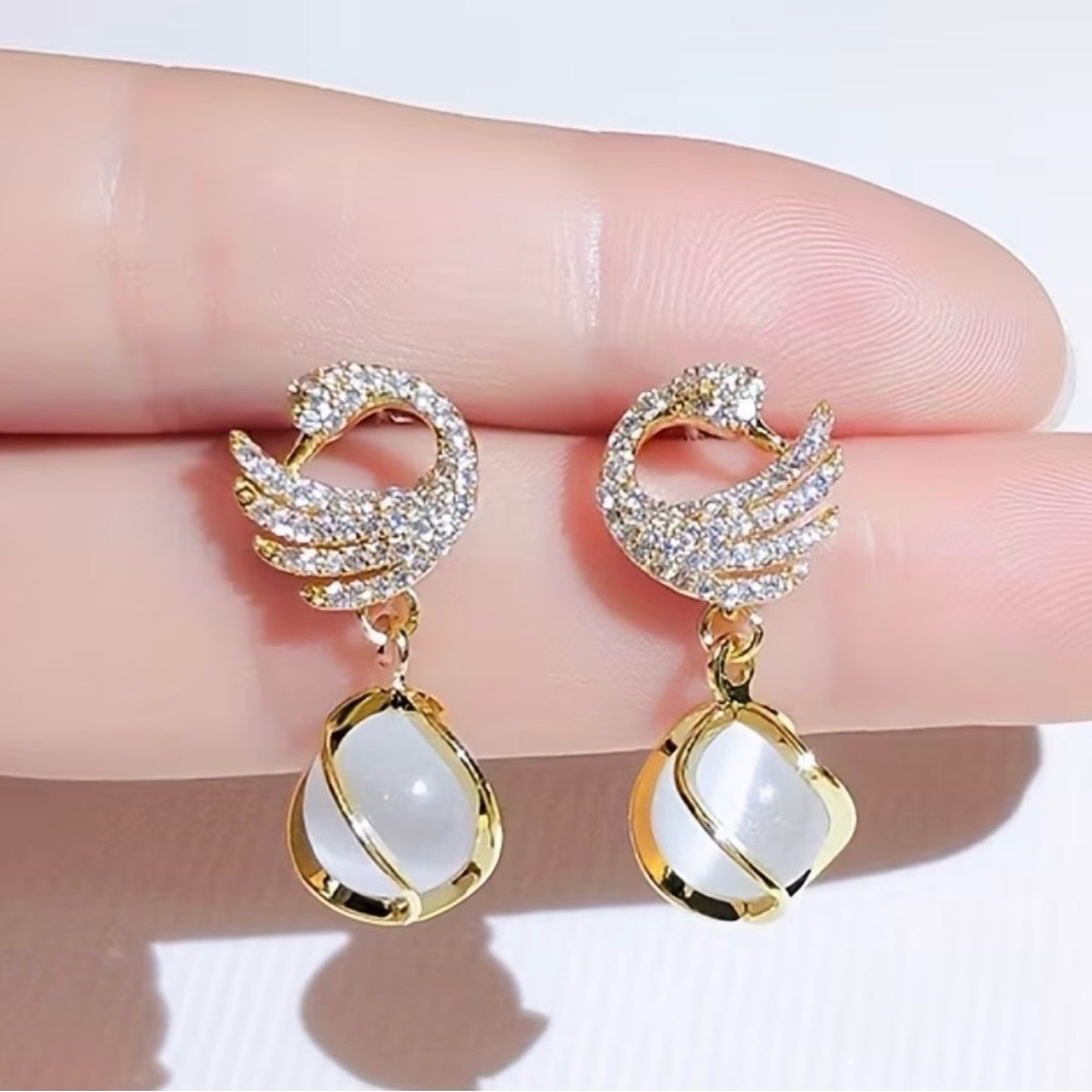 Elegant Gold and White Swan Earrings